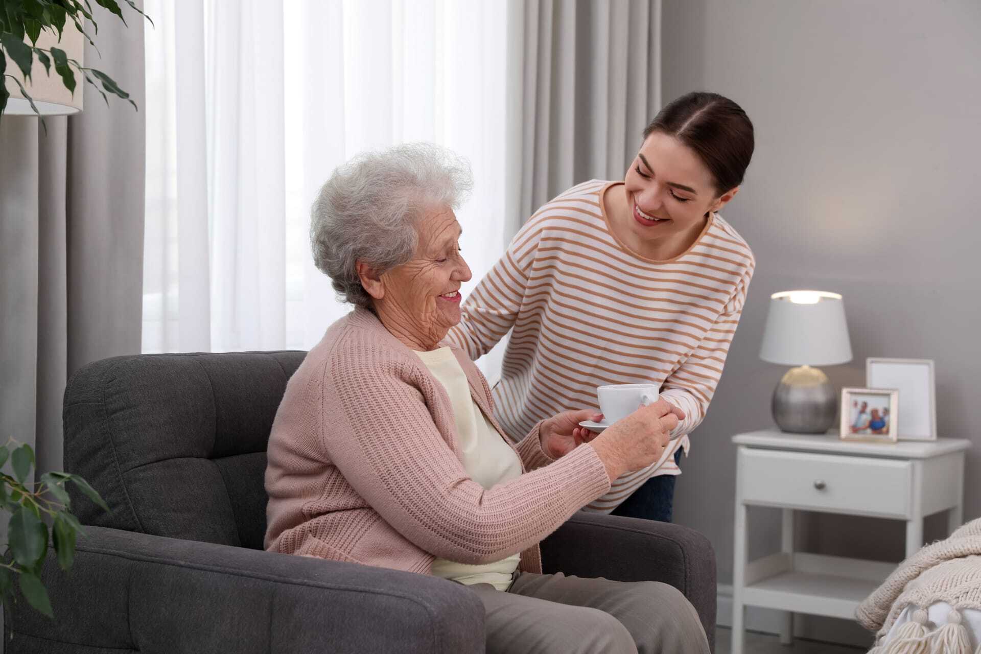 caregiver assisting senior